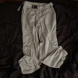 green cargo windbreaker type material pants with elastic ankle from zumiez store